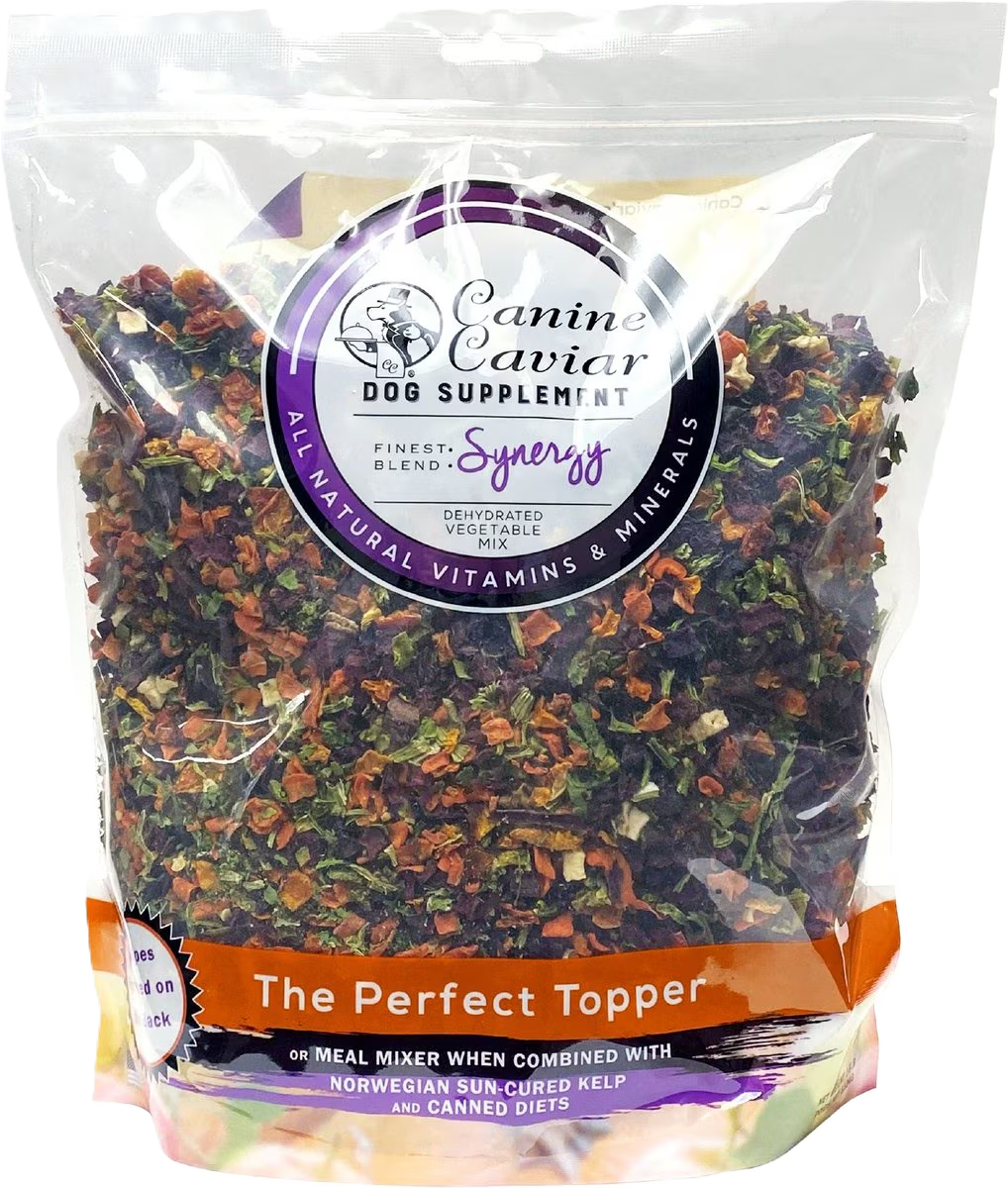 The packaging for Canine Caviar Synergy, a dehydrated vegetable mix for dogs designed to add fiber and nutrients to any diet.