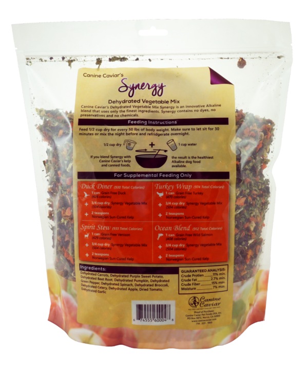 The rehydrated texture of the Canine Caviar Synergy vegetable mix, showing the colorful blend of carrots, sweet potato, spinach, and other vegetables.