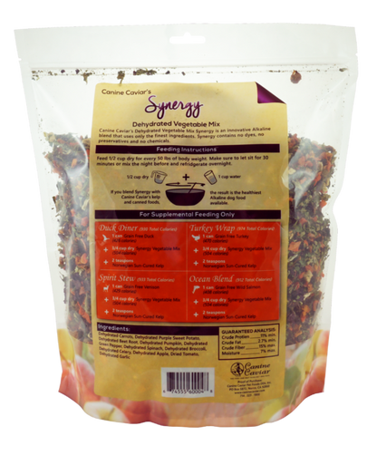 The rehydrated texture of the Canine Caviar Synergy vegetable mix, showing the colorful blend of carrots, sweet potato, spinach, and other vegetables.