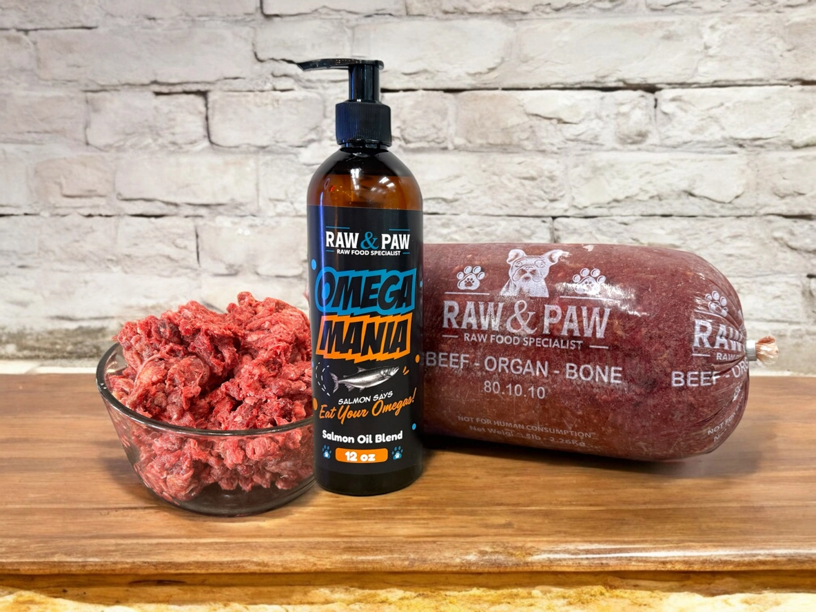 The bottle of Omega Mania from Raw & Paw Naturals, a complete omega oil blend for dogs with salmon, MCT, flaxseed, and wheatgerm oil.