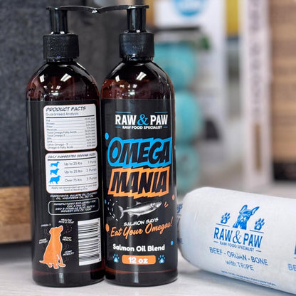 The bottle of Omega Mania from Raw & Paw Naturals, a complete omega oil blend for dogs with salmon, MCT, flaxseed, and wheatgerm oil.